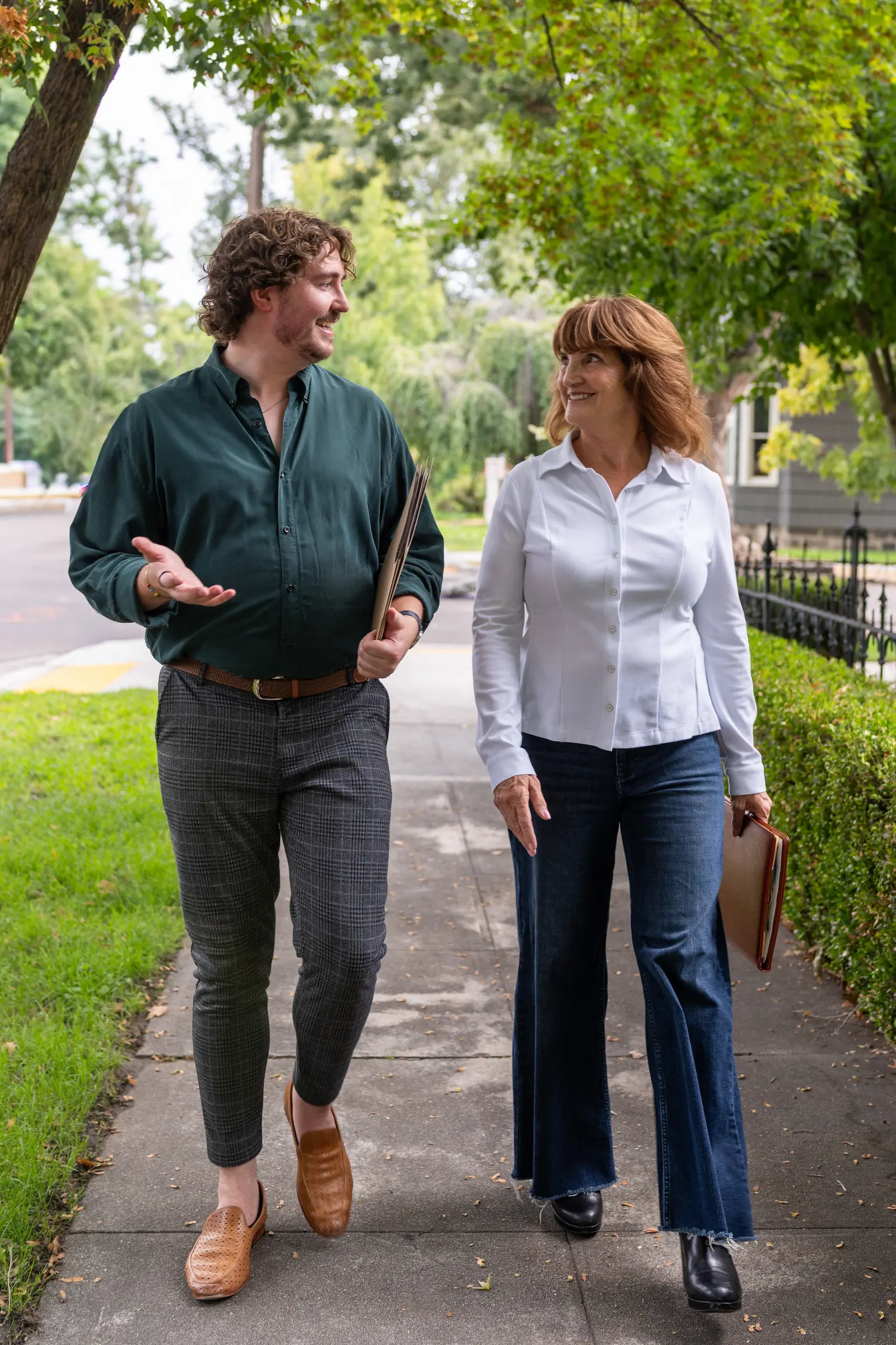 Josh and Tracy walking on sidewalk in Boise's North End