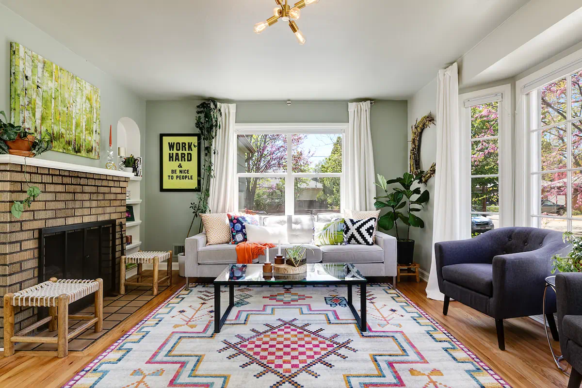 Interior shot of a beautiful living room in Boise's historic East End, showcasing first-time buyer Jenn J's incredible experience working with Josh and the team